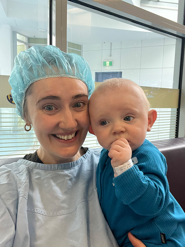 Flynn as a newbord and his mum in hospital