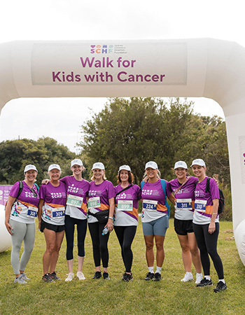 A group of Walk for Kids with Cancer participants ready at the Middle Distance starting line